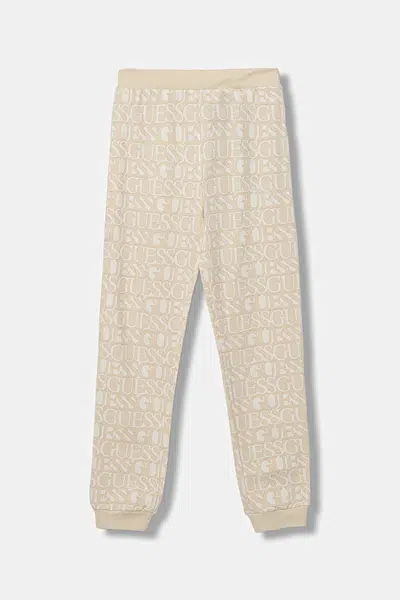 Dětské bavlněné tepláky Guess béžová barva, J5YQ13 KAD74