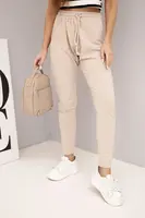 Dámské béžové cargo kalhoty s kapsami a řetízkem