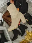Resti Women's eco-suede heeled ankle boots with a sock-like insert LumenThorn