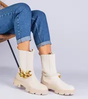 Gemre Beige ankle boots decorated with a chunky chain Florisenda