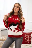 Red sweater with a Christmas motif