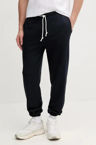 Tepláky Tommy Hilfiger pánské, tmavomodrá barva, melanžové, UM0UM03513