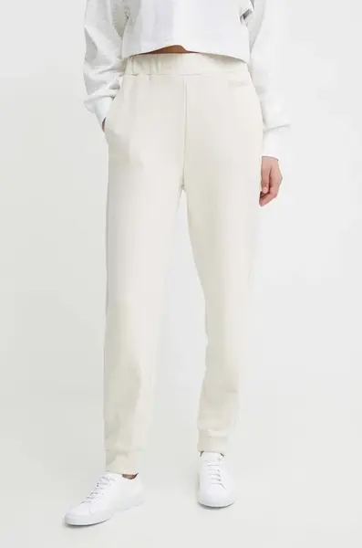 Tepláky Calvin Klein béžová barva, hladké, K20K206632