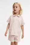 Dětská bavlněná souprava Liewood Leona Stripe Set oranžová barva, LW19795