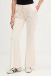 Velurové teplákové kalhoty Juicy Couture CAISA LOW RISE PANT dámské, růžová barva, JCSEBJ008G