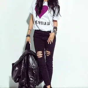 Black classic jeans with numerous abrasions By o la la