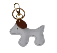 NovaKabelka.cz Klíčenka Cane Bianco Camel