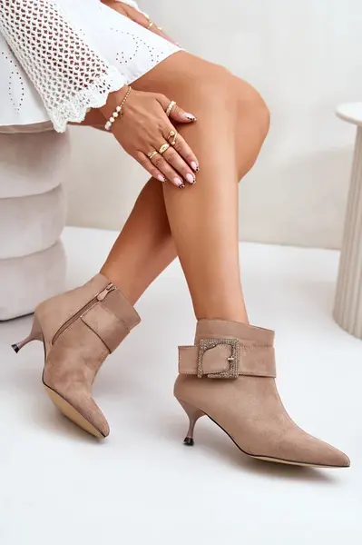 Women's ankle boots on stiletto heel with decorative buckle beige Nirilis