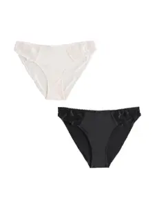 Next Nohavičky  čierna / prírodná biela