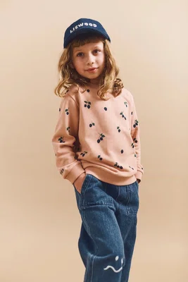 Dětská bavlněná mikina Liewood Thora Printed Sweatshirt oranžová barva, vzorovaná, LW20357