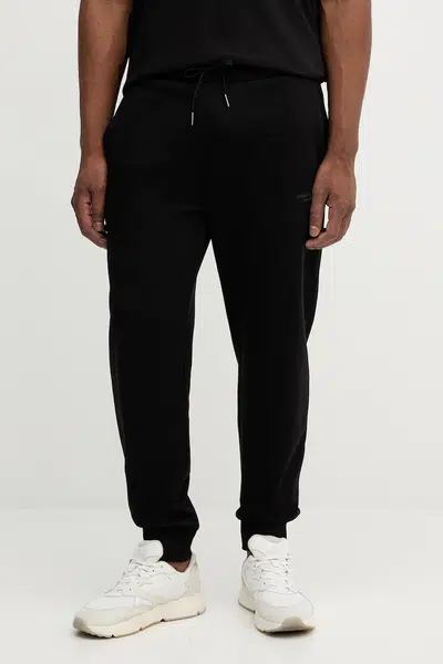 Bavlněné tepláky Armani Exchange pánské, černá barva, XM001299 AF20934