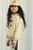 Dětská bavlněná mikina Mini Rodini Note