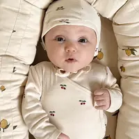Dětská bavlněná čepice Konges Sløjd BABY HELMET GOTS béžová barva, z tenké pleteniny