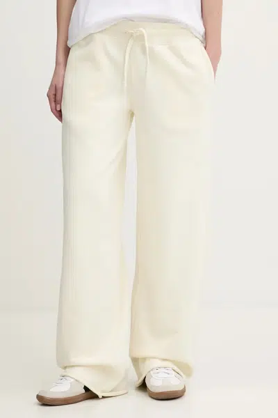 Bavlněné tepláky Superdry béžová barva, W7011210A-71D