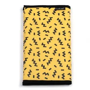 KipKep pouzdro na plenky DIAPER WALLET Memphis Yellow