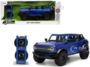 2021 Ford Bronco Open-Top Candy Blue Metallic with Extra Wheels "Just Trucks" Series 1/24 Diecast Model Car by Jada