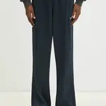 Tepláky adidas Originals Flare Pant pánské, tmavomodrá barva, hladké, JC8382