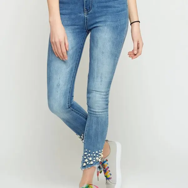 Jeans decorated with abrasions and pearls blue