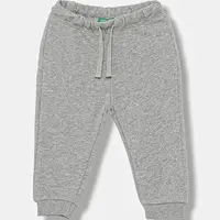 Dětské bavlněné tepláky United Colors of Benetton