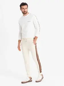 Ombre Men's sweatpants with piping and ribbing on the legs - cream