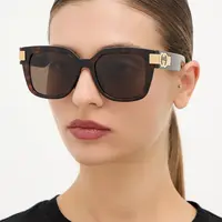 Sluneční brýle Gucci dámské, hnědá barva, GG1690SK