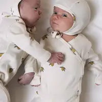 Dětská bavlněná čepice Konges Sløjd BABY HELMET GOTS béžová barva, z tenké pleteniny