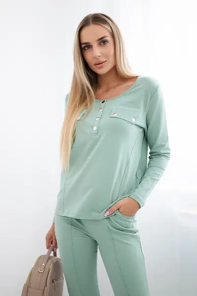Set with a neckline with press studs dark mint