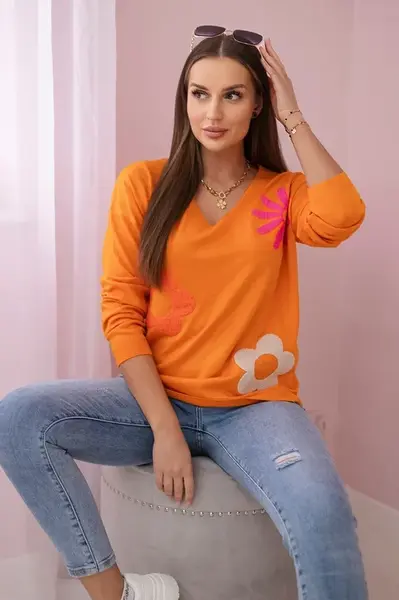 Sweater blouse with orange floral pattern