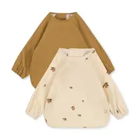 Dětský podbradník Konges Sløjd 2 PACK DINNER BIB WITH SLEEVES 2-pack