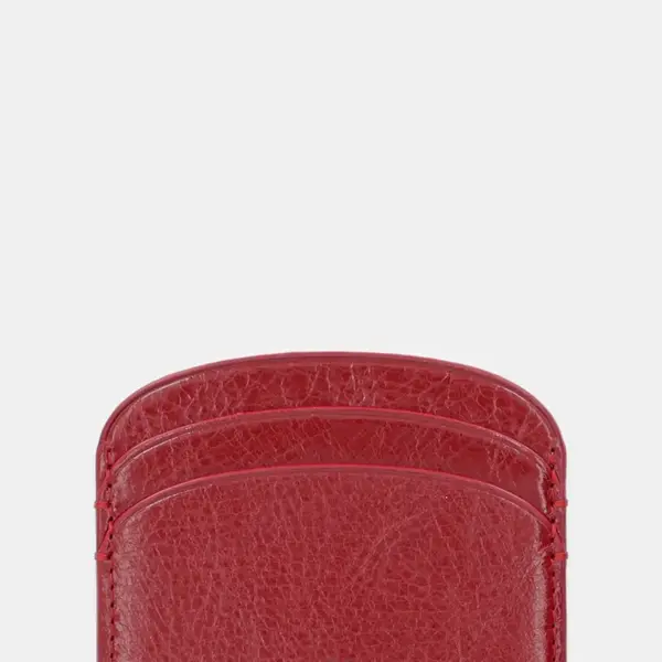 Kožené pouzdro na karty A.P.C. porte-cartes demi-lune červená barva, PXCCK.F63270