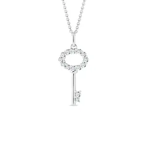 Přívěsek klíček z bílého zlata s diamanty KLENOTA