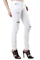 Bílé skinny džíny s roztrhaným efektem