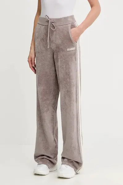 Tepláky Guess EMILIA dámské, béžová barva, s aplikací, V5BB09 Z1170