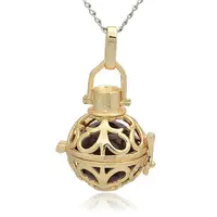 Golden Tone Brass Hollow Round Cage Pendants