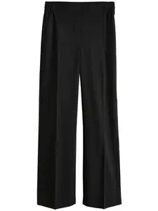 Next Nohavice s pukmi  čierna