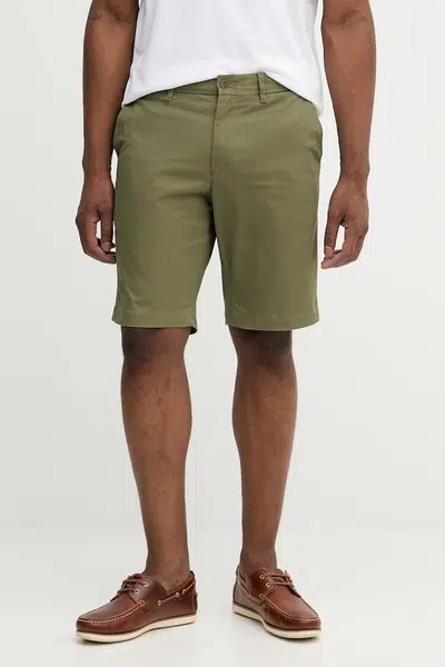 Kraťasy Tommy Hilfiger pánské, žlutá barva