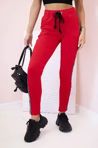 Kesi Dámské teplákové kalhoty s lampasem a šňůrkou v pase červené