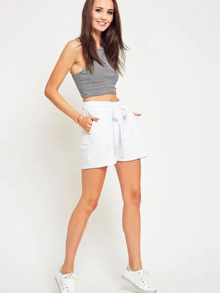 White shorts tied at the waist