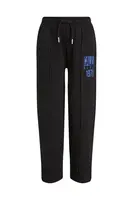 Detské bavlnené tepláky Calvin Klein Jeans