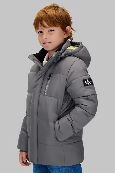 Dětská zimní bunda Calvin Klein Jeans béžová barva, IB0IB01276
