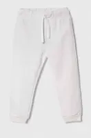 Dětské bavlněné tepláky United Colors of Benetton bílá barva