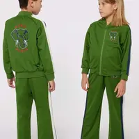 Dětské kalhoty Kenzo Kids zelená barva, s aplikací, K60716