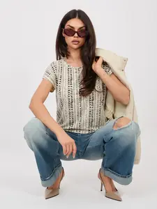 Světloběžná vzorovaná halenka