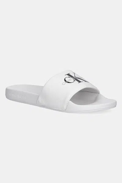 Pantofle Calvin Klein Jeans SLIDE MONOGRAM pánské, bílá barva, YM0YM01271