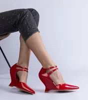 Gemre Red patent wedge pumps with buckles Vizario