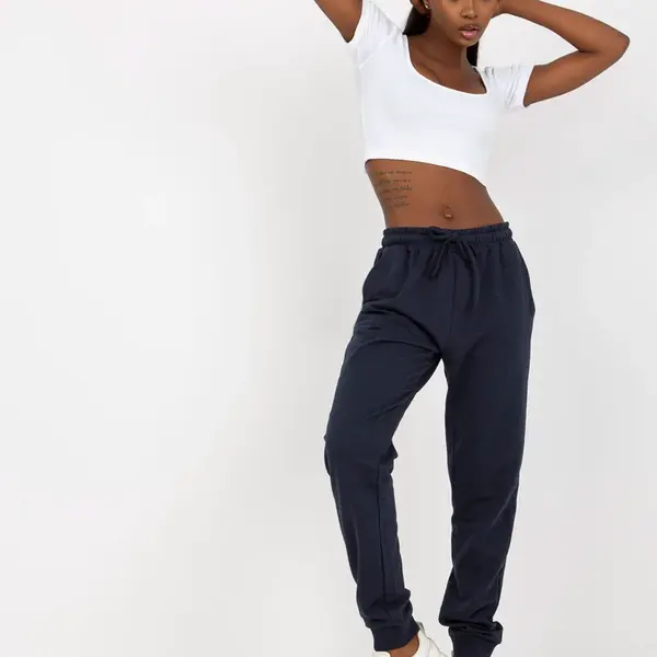 Navy blue sweatpants tied at the waist