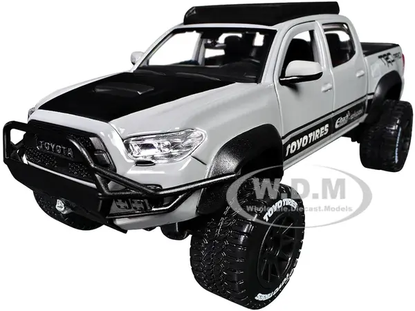 2023 Toyota Tacoma TRD PRO Off Road Pickup Truck Cement Gray with Black Hood and Roofrack "Maisto Design" Series 1/27 Diecast Model Car by Maisto