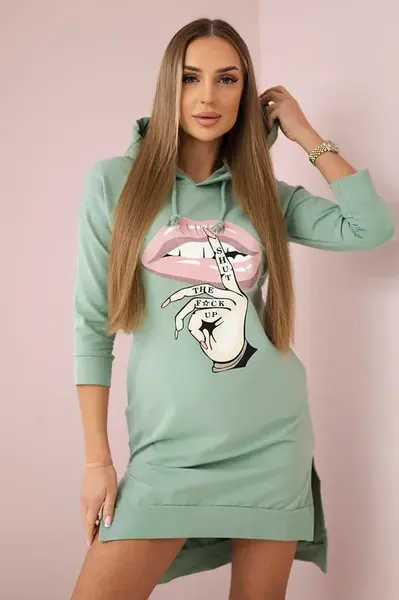 Dress with a longer back and a colorful dark mint print