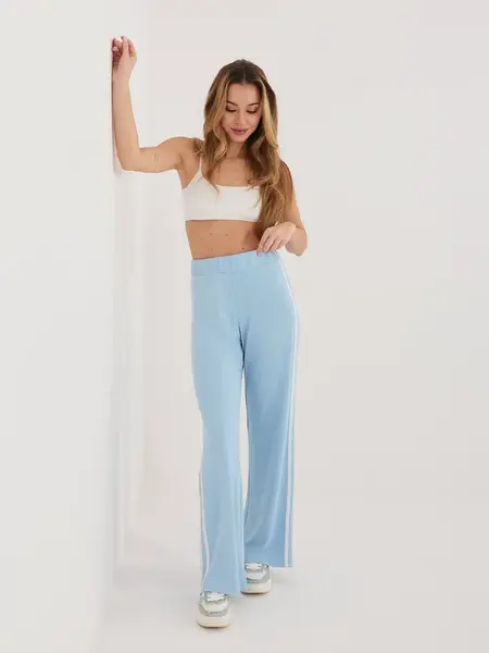 Světle modré dámské tepláky