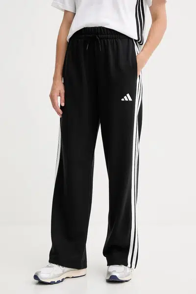 Tepláky adidas Essentials dámské, černá barva, s aplikací, JW7182